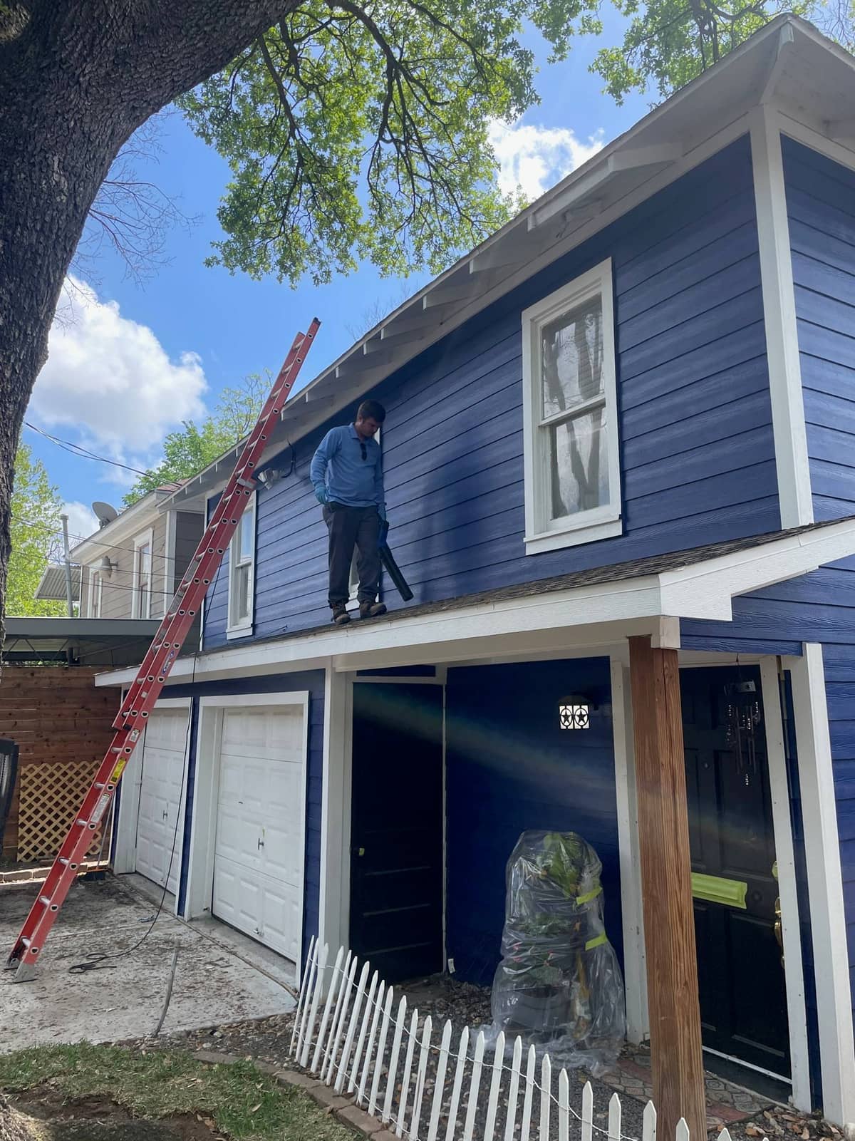 Driveway after pressure washing shows bright, even concrete in Houston, TX
