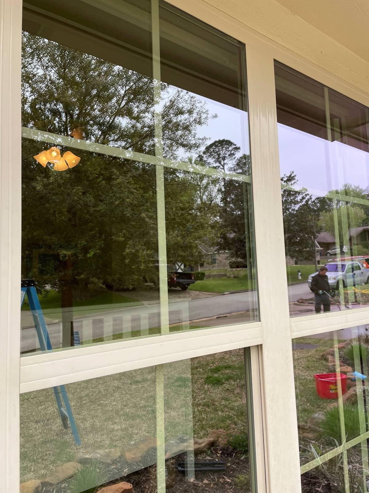 Freshly washed exterior siding brightening up this Huntsville, TX listing