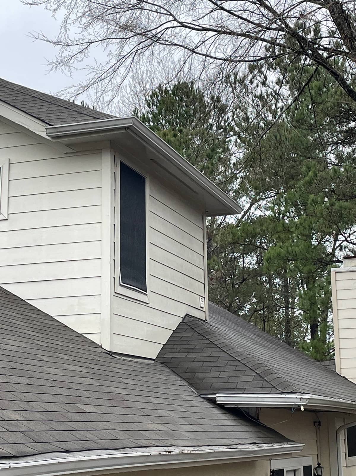 Gutter guards temporarily removed to fully clean this Spring, TX home's gutters